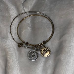 Gold P bracelets